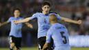 Gelandang Uruguay, Federico Valverde, melakukan selebrasi usai mencetak gol ke gawang Paraguay pada laga kualifikasi piala dunia 2018 di Stadion Defensores del Chaco, Rabu (6/9/2017). Uruguay menang 2-1 atas Paraguay. (AP/Jorge Saenz)