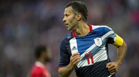 6. Ryan Giggs (Inggris Raya). Legenda Manchester United ini tampil pada Olimpiade London 2012. Dirinya tercatat sebagai pencetak gol tertua di Olimpiade yaitu 38 tahun dan 243 hari. (AFP/Adrian Dennis)
