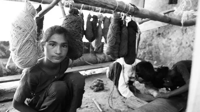 Pekerja anak di industri sandang India. (Sumber Flickr/International Labour Organisation)