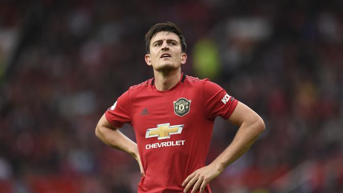 Pemain baru MU, Harry Maguire tampil gemilang di laga lawan Chelsea, Minggu (11/8). (Oli SCARFF / AFP)