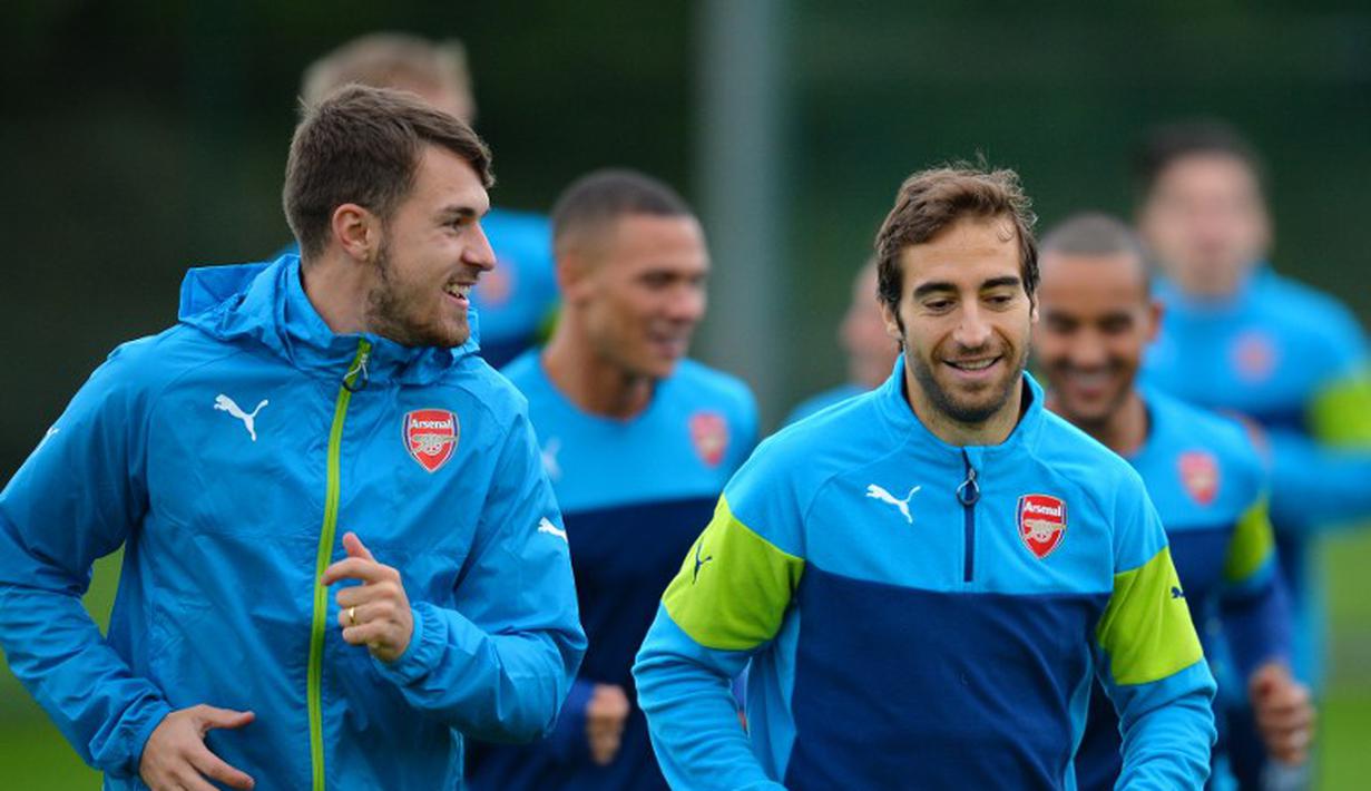 Jam bermain Mathieu Flamini kian mengetat pasca performa menanjak Francis Coquelin, kontraknya pun berpeluang tak diperpanjang (GLYN KIRK / AFP)