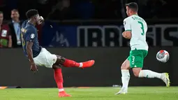 Dua gol kemenangan Prancis pada laga yang berlangsung cukup sengit itu, dicetak Aurelien Tchouameni dan Marcus Thuram. (AP Photo/Michel Euler)