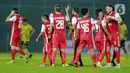 Para pemain Persija Jakarta merayakan kemenangan atas Barito Putera pada laga perempat final Piala Menpora 2021 di Stadion Kanjuruhan, Malang, Sabtu (10/4/2021). Persija Jakarta menang dengan skor 1-0. (Bola.com/Arief Bagus)