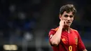 <p>Reaksi gelandang Spanyol Pablo Gavi selama pertandingan semifinal UEFA Nations League melawan Italia di stadion San Siro, di Milan, Rabu (6//9/2021). Wonderkid Barcelona, Gavi mencatatkan sejarah sebagai pemain termuda yang pernah tampil bersama timnas senior Spanyol. (FRANCK FIFE / AFP)</p>