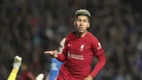 Roberto Firmino dari Liverpool berselebrasi setelah mencetak gol ke gawang Rangers pada pertandingan Grup A Liga Champions di stadion Ibrox di Glasgow, Skotlandia, Rabu, 12 Oktober 2022. (AP Photo/Scott Heppell, File)