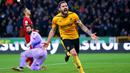 Pemain Wolverhampton Wanderers Ruben Neves melakukan selebrasi usai mencetak gol ke gawang Liverpool pada pertandingan sepak bola Liga Inggris di Stadion Molineux, Wolverhampton, Inggris, 4 Februari 2023. Wolverhampton Wanderers mengalahkan Liverpool dengan skor 3-0. (Barrington Coombs/PA via AP)