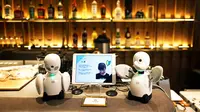 Keberadaan robot-robot di Dawn Cafe dimaksudkan lebih dari sekadar gimmick bagi pengunjung. (Foto: BEHROUZ MEHRI / AFP)