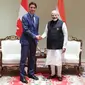 Perdana Menteri Kanada Justin Trudeau dan Perdana Menteri India Narendra Modi di sela-sela KTT G20 di New Delhi, India. (Twitter/@narendramodi)