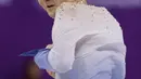 Ekspresi atlet figure skating dari Uzbekistan, Misha Ge saat berlaga di final Olimpiade Musim Dingin 2018 di Gangneung Ice Arena, Korea Selatan (17/2). (AP Photo / David J. Phillip)