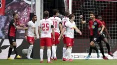 Pemain Hertha Berlin, Marko Grujic, melakukan selebrasi usai membobol gawang RB Leipzig pada laga  Bundesliga di Red Bull Arena, Rabu (27/5/2020). Kedua tim bermain imbang 2-2. (AP/Alexander Hassenstein)