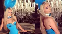 Paris Hilton nampak begitu seksi dan menggoda mengenak kostum kelinci berwarna biru dengan rambutnya terurai panjang. (sumber: dailymail)