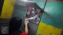 Loket pembayaran atraksi 'Tong setan' di pasar malam PURI BETA II, Tangerang , Banten, Kamis (31/12). Untuk menonton pertunjukan ini di kenakan biaya 7000 sekali masuk tong setan. (Liputan6.com/Helmi Afandi)