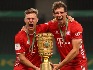 Duet Joshua Kimmich dan Leon Goretzka telah membawa Bayern Munchen menyabet banyak gelar bergengsi. Kimmich merupakan sosok yang cerdas dengan kualitas teknis yang luar biasa. Sementara itu, Goretzka lebih merupakan gelandang box-to-box yang suka menyerang ke depan. (AFP/Alexander Hassenstein)
