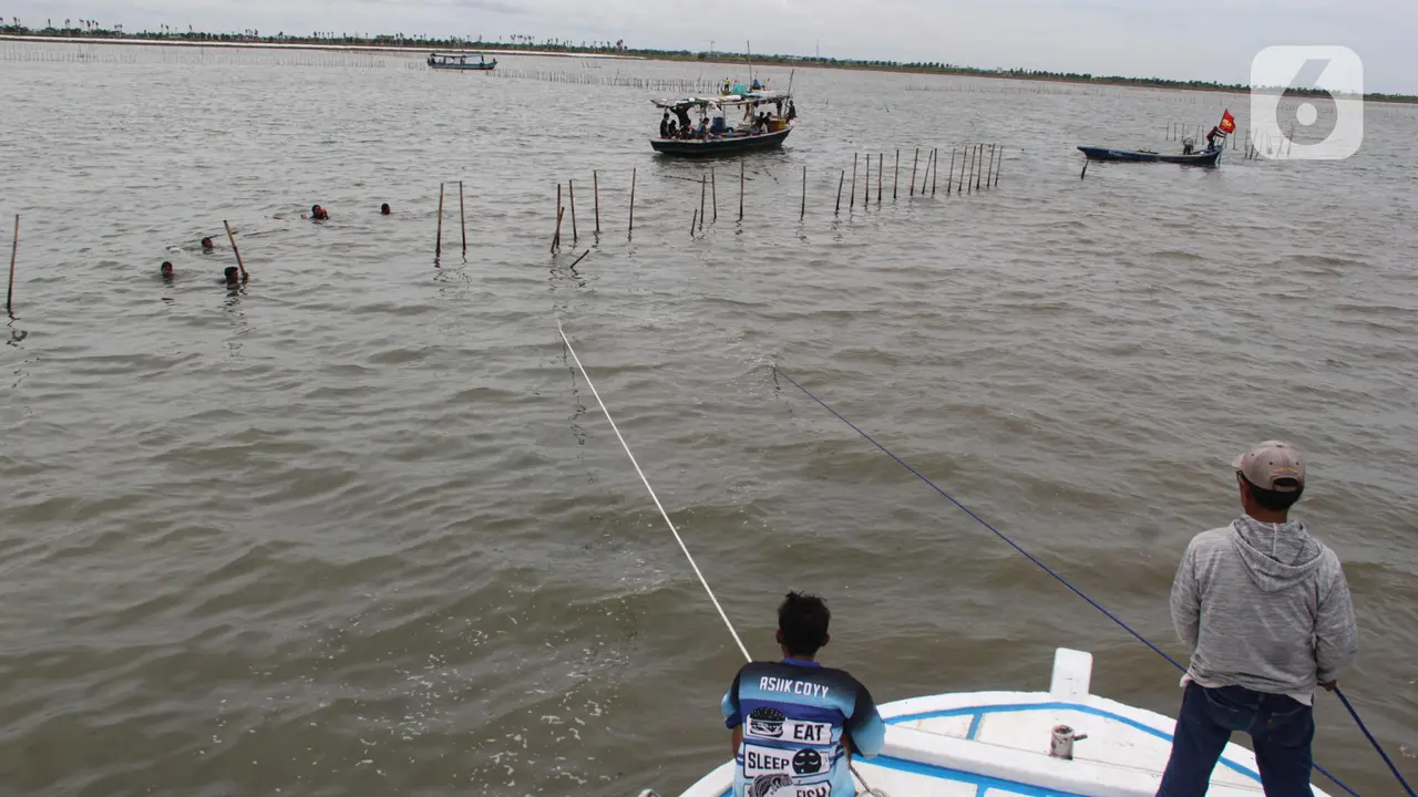 Secara Serentak, Ribuan Personel Gabungan Bersama Nelayan Bongkar Pagar Laut di Tangerang