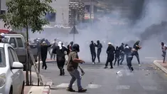 Pengunjuk rasa Druze bentrok dengan polisi Israel yang menembakkan gas air mata di Dataran Tinggi Golan, Rabu, 21 Juni 2023. (AP Photo/Fadi Amun)
