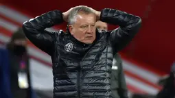 Manajer Sheffield United, Chris Wilder, tampak kecewa dalam laga lanjutan Liga Inggris pekan ke-13 melawan Manchester United di Bramall Lane, Sheffield, Kamis (17/12/2020). Sheffield United kalah 2-3 dari Manchester United. (AFP/Rui Vieira/Pool)