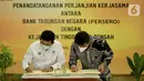 Kakanwil 6 PT Bank Tabungan Negara (Persero) Tbk. Edward Alimin Syarif (kanan) dan Kepala Kejati Jawa Tengah Priyanto (kiri) menandatangani naskah Perjanjian Kerja Sama (PKS) di Kantor Kejati Jateng, Semarang, Rabu (09/06/2021). (Liputan6.com/HO/BTN)