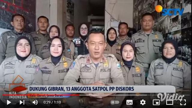 Video sejumlah orang yang mengenakan seragam Satpol PP mendukung calon wakil presiden Gibran Rakabuming Raka viral di media sosial. (YouTube Liputan6)