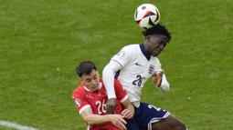 Awalnya Mainoo hanya menjadi pemain pelapis. Hingga pertandingan terakhir fase grup ia hanya jadi pemain pengganti di skuat Inggris. (AP Photo/Hassan Ammar)