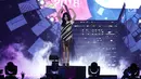 Penampilan personil SNSD Taeyeon saat menghibur penonton acara Count Down Asian Games 2018 di Monas, Jakarta, Jumat (18/7). Penyanyi berusia 28 tahun ini naik ke atas stage dengan dress berwana hitam putih. (Liputan6.com/Herman Zakharia)