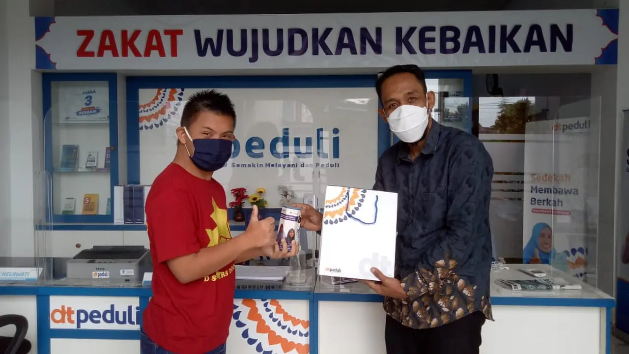 Nabil Dhiya Ulhaq A’isy remaja down syndrome lakukan kegiatan amal di bulan Ramadan.