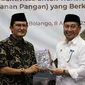 Wakil Ketua MPR RI Fadel Muhammad bersama Bupati Bone Bolango Hamim Pou (Arfandi Ibrahim/Liputan6.com)
