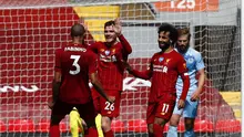 Bek Liverpool Andrew Robertson bersama rekan setimnya merayakan gol ke gawang Burnley pada pekan ke-35 Liga Inggris di Stadion Anfield, Sabtu (11/7/2020). (foto: Clive Brunskill/ Pool via AP)