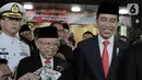 Joko Widodo atau Jokowi (kanan) dan Ma'ruf Amin (kiri) memberi keterangan usai dilantik menjadi Presiden dan Wakil Presiden RI periode 2019-2024 di Gedung Nusantara, Jakarta, Minggu (20/10/2019). Jokowi dan Ma'ruf Amin terlihat senyum semringah usai pelantikan. (merdeka.com/Iqbal Nugroho)