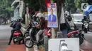 Sejumlah pengendara sepeda motor menerobos pembatas jalan saat akan memutar arah di Alteri Pondok Indah, Jakarta, Rabu (10/1/2024). (Liputan6.com/Angga Yuniar)