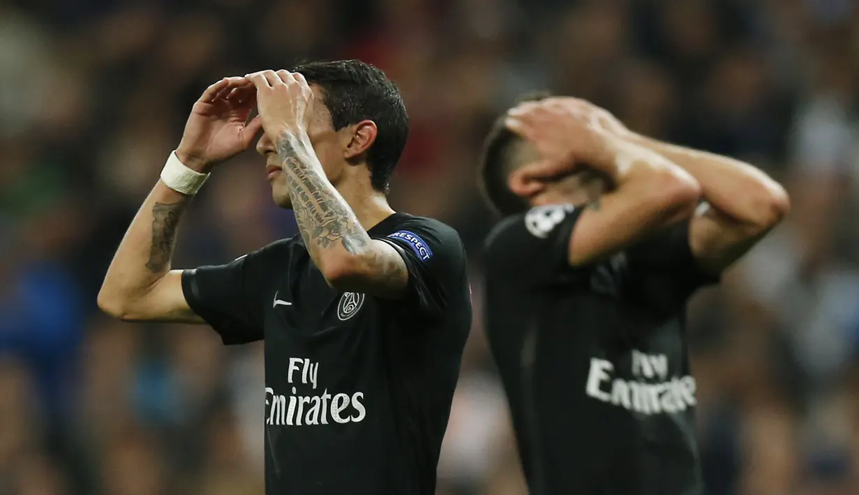Ekspresi pemain PSG Angel Di Maria dan Thiago Motta  pada lanjutan Liga Champions Grup A di Stadion Santiago Bernabeu, Madrid, Rabu(4/11/2015) dini hari. Madrid menang tipis 1-0.  (Reuters / Sergio Perez)