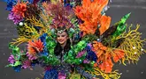 Peserta yang mengenakan kostum bertema HEAL (Kemanusiaan, Bumi, dan Kehidupan) mengikuti Jember Fashion Carnaval (JFC) ke-24 di Jember, Jawa Timur, Minggu (26/7/2026). (AFP/ Juni Krsiwanto)
