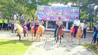 Kuda Mini Kawal Perayaan Natal dan Tahun Baru di Sulawesi Tenggara. (Liputan6.com/Ahmad Akbar Fua)