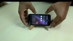 Bermodal karton dan gunting, anda tak perlu repot membeli dudukan handphone dengan harga mahal.