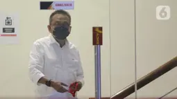 Wakil Ketua DPRD DKI Jakarta, M Taufik usai menjalani pemeriksaan sebagai saksi di Gedung KPK Jakarta, Selasa (10/8/2021). M Taufik diperiksa sebagai saksi untuk Yoory Corneles, tersangka kasus dugaan korupsi pengadaan tanah di Munjul, Pondok Ranggan, Jakarta. (Liputan6.com/Helmi Fithriansyah)