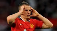 Reaksi dari gelandang Manchester United Tom Cleverley ketika MU bertemu Tottenham Hotspur dalam laga Liga Premier di Old Trafford, 22 Agustus 2011. AFP PHOTO/ANDREW YATES