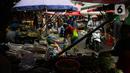 Warga berbelanja kebutuhan pangan di Pasar Kebayoran Lama, Jakarta, Rabu (21/2/2024). (Liputan6.com/Angga Yuniar)