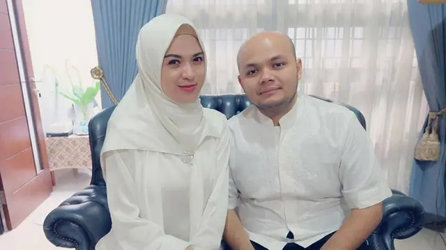 Delia Septianti dan suami, Tofan Pohan.