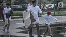 Jemaah Muhammadiyah saat tiba untuk menunaikan Salat Idul Fitri 1444 H di halaman Jakarta International Equestrian Park, Pulomas, Jakarta Timur, Jumat (21/4/2023). (merdeka.com/Iqbal S Nugroho)