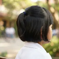 Model Kuncir Rambut Anak Sekolah untuk Rambut Pendek (AI Generated)