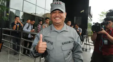 Kepala Badan Keamanan Laut (Bakamla) Laksamana Madya Achmad Taufiqoerrochman seusai bertemu pimpinan KPK di Jakarta, Kamis (17/1). Kunjungan tersebut merupakan langkah pengenalan yang dilakukannya sebagai pejabat baru. (Merdeka.com/Dwi Narwoko)