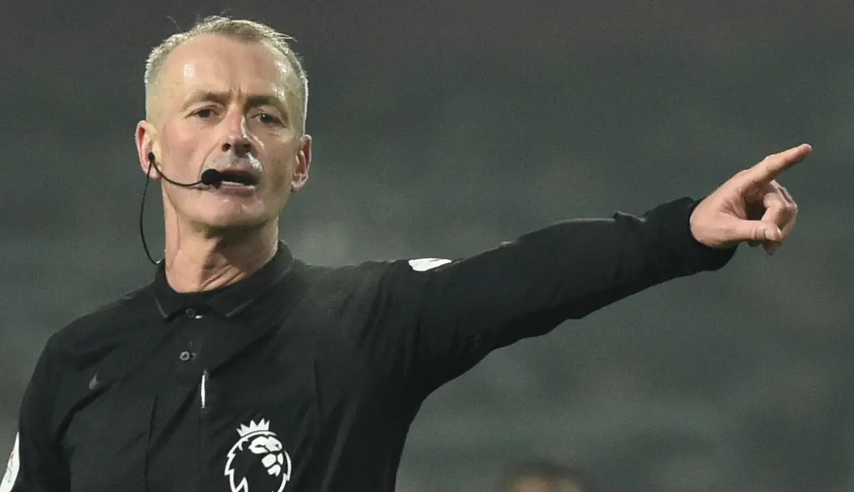 Laga akan dipimpin oleh wasit Martin Atkinson. Arsenal selalu menang dan mencatat clean sheet dalam dua laga terakhir di Liga Inggris yang dipimpin oleh wasit Martin Atkinson. (Foto: AFP/Pool/Rui Vieira)
