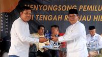 Wakil Ketua DPW PPP Jatim Mujahid Ansori (kanan).