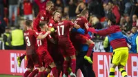 Para pemain Republik Ceska merayakan gol ke gawang Jerman pada laga Grup C kualifikasi Piala Dunia 2018 di Plzen, Republik Ceska (1/9/2017). Jerman menang 2-1. (AFP/Robert Michael)