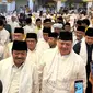 Ketua Umum Partai Golkar Airlangga Hartarto menghadiri penyelenggaraan Gerakan Indonesia Bertadarus Alquran yang disingkat Gibran di Alexandria Islamic Boarding School, Jalan Pengasinan, Bekasi Timur, Jawa Barat, Kamis (25/1/2024). (Liputan6.com/Nanda Perdana Putra)