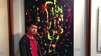 Anfield Wibowo, remaja asperger yang jago melukis. (Foto: Liputan6.com/Jihan Khaldaf)