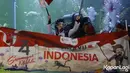 Awalnya Aaliyah Massaid tidak berani untuk melakukan pengibaran bendera di dalam air. Namun berkat pelatih, dirinya pun mantap dan melaksanakan tugasnya untuk jadi pasukan pengibar bendera Merah Putih di dalam air Sea World Indonesia. (Kapanlagi.com/Bambang E. Ros)