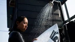 Minori Kawai usai mengikuti sesi latihan di Ichinomiya, prefektur Chiba (8/7). Kawai yang memenangkan Chiba Open bulan lalu merasa dia akan memiliki keunggulan psikologis saat debutnya di Olimpiade tiga tahun lagi. (AFP Photo/Behrouz Mehri)