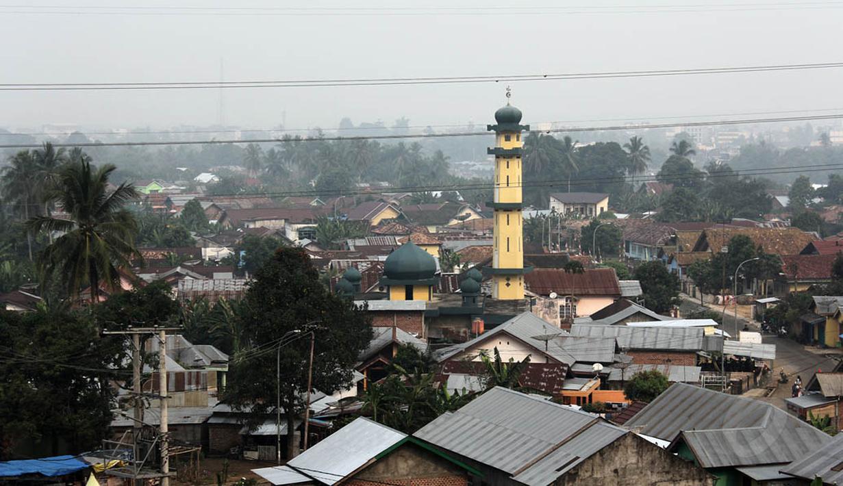 Masyarakat berharap pemerintah cepat mengambil tindakan serius terhadap kejadian ini dan membagikan masker gratis, Sumatera Selatan, (14/10/14). (Liputan6.com/Faizal Fanani)