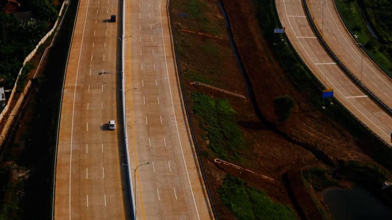 Dalam rangka sosialisasi, pihak pengelola akan menggratiskan Tol Cimanggis-Cibitung hingga akhri Juli 2024 mendatang.&nbsp;Foto: Merdeka.com/Imam Buhori