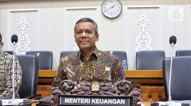 Wakil Menteri Keuangan (Wamenkeu) Suahasil Nazara mengikuti rapat kerja dengan Badan Legislasi DPR RI di kompleks Parlemen, Jakarta, Kamis (18/8/2022). Raker tersebut dalam rangka harmonisasi Rancangan Undang-Undang (RUU) tentang pengembangan dan penguatan sektor keuangan. (Liputan6.com/Angga Yuniar)